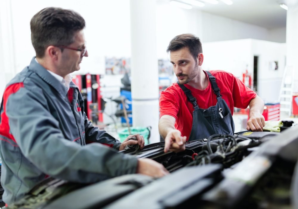 car-mechanics-working-at-automotive-service-center.jpg